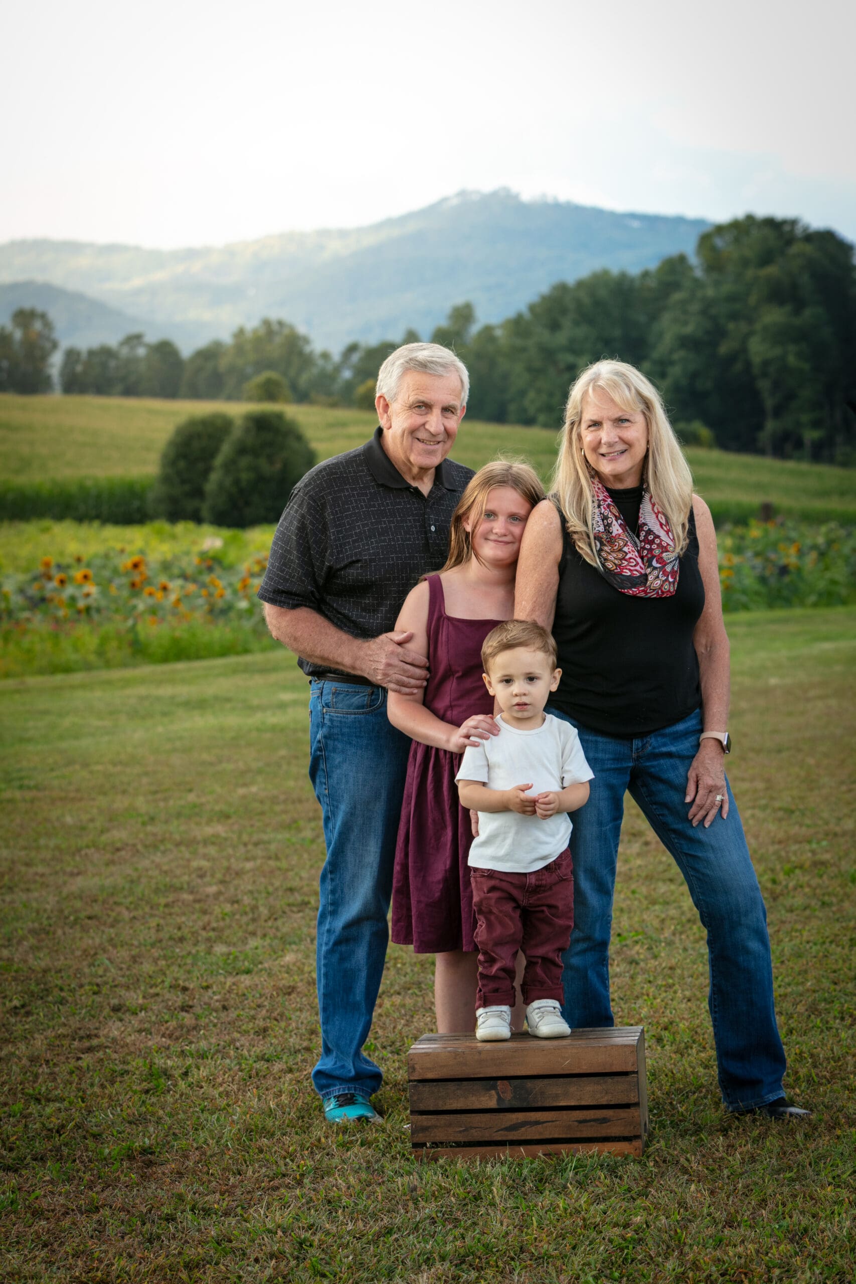 Family portraits outdoors with mountain views in Asheville NC